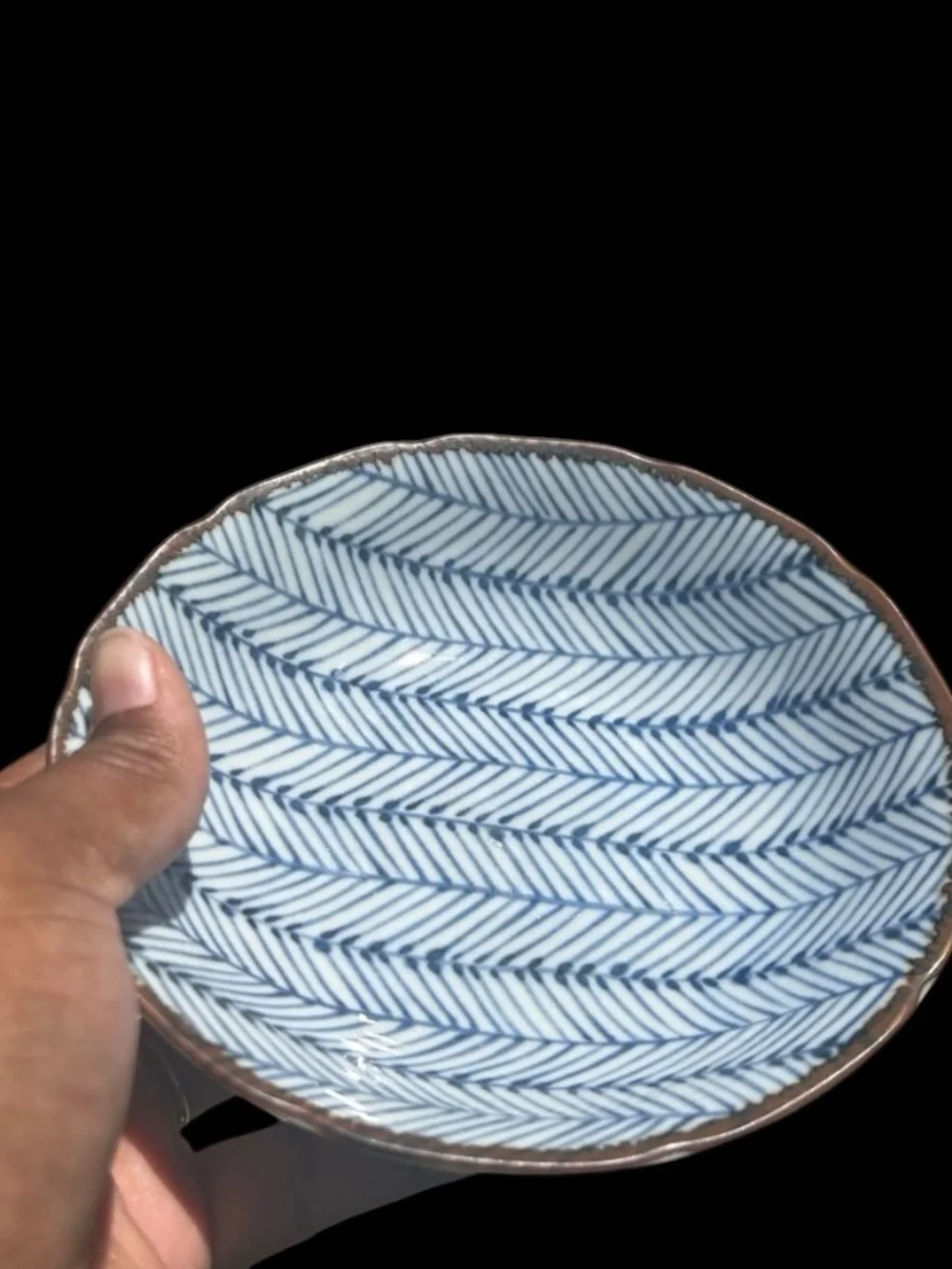 Japanese porcelain bowl, sake, and plate set.